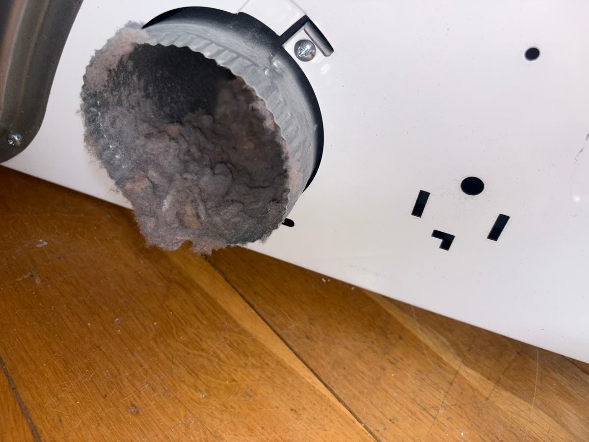 Dryer duct packed solid with lint before cleaning